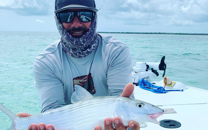 An image of an angler with a bonefish caught on Nautical Fishing Charter